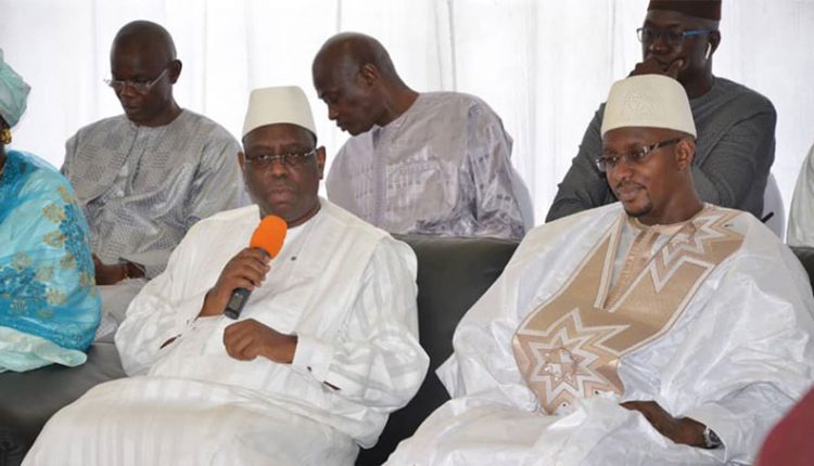 Ministre Moustapha Diop et le président Macky Sall